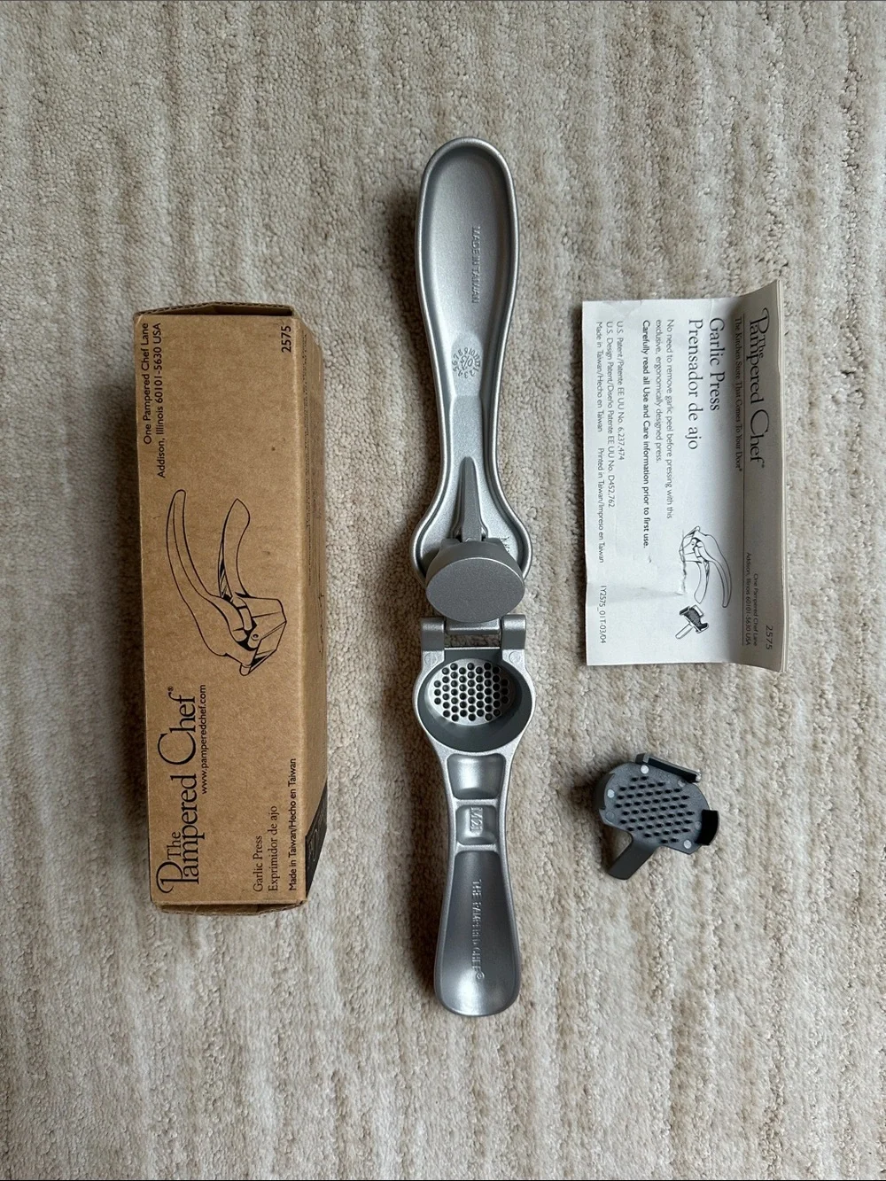 The Pampered Chef Metal Garlic Press #2575 with Cleaning Tool